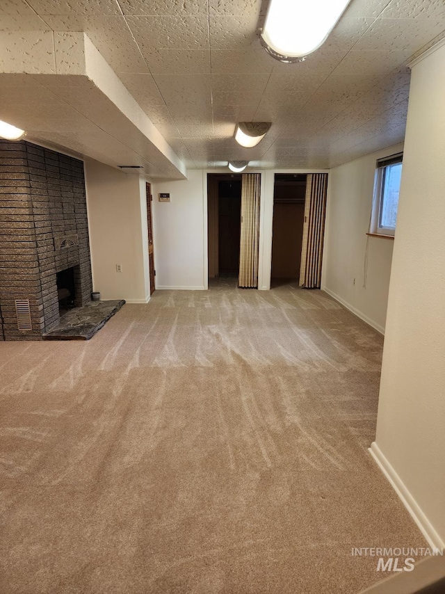 855 N 9th E, Mountain Home, ID 83647 - unfurnished living room with light carpet and baseboards