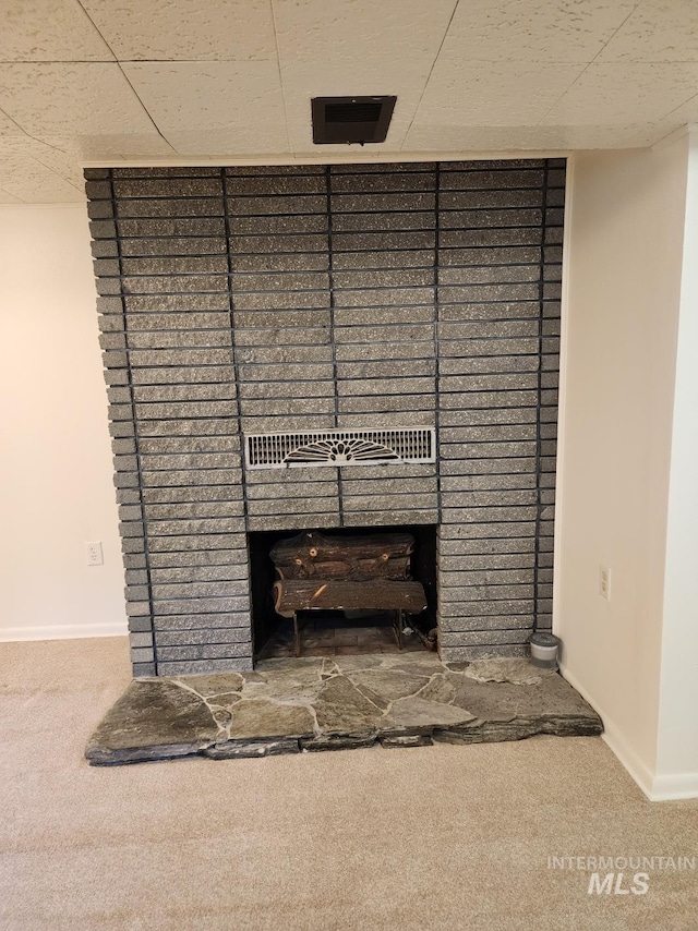 855 N 9th E, Mountain Home, ID 83647 - detailed view of carpet flooring, baseboards, and a paneled ceiling