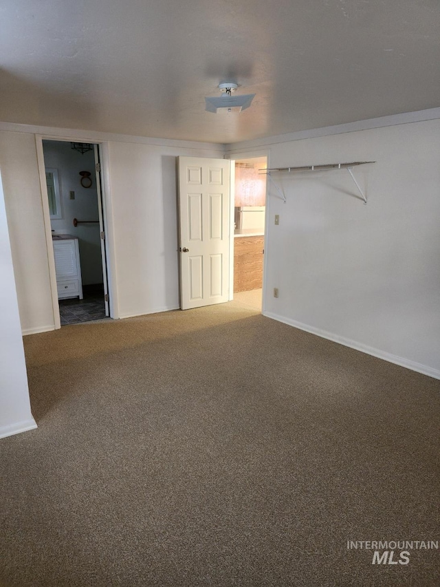 855 N 9th E, Mountain Home, ID 83647 - unfurnished room with carpet flooring and baseboards