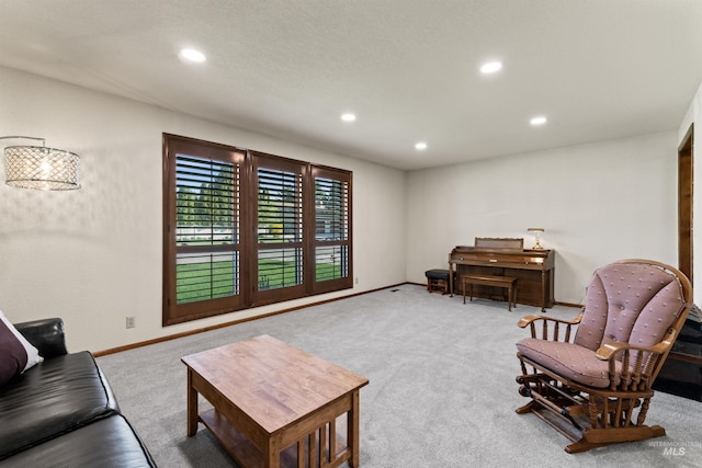 interior space featuring baseboards, recessed lighting, and carpet