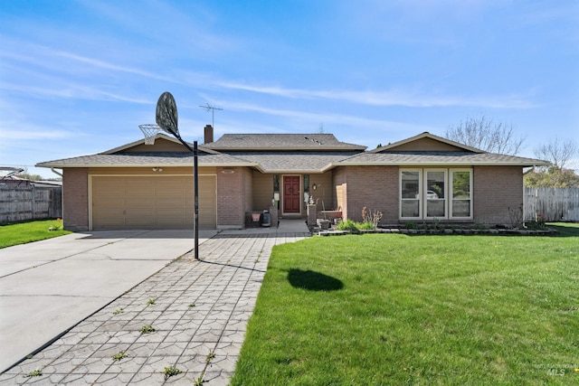 ranch-style home with fence, driveway, a front yard, and a garage