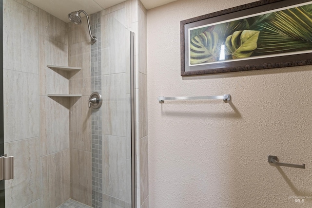 bathroom featuring a stall shower