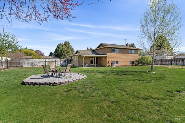 view of yard featuring a fenced backyard and a patio