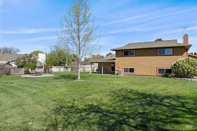 view of yard with a patio area and fence