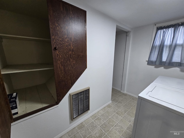 701 Union Ave, Filer, ID 83328 - clothes washing area with washing machine and dryer, baseboards, laundry area, and visible vents
