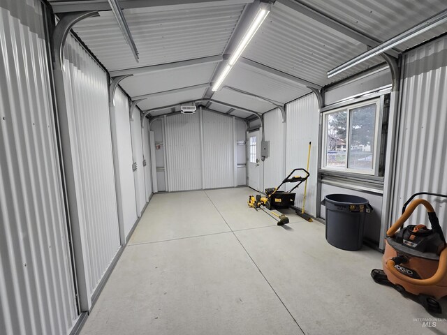 701 Union Ave, Filer, ID 83328 - garage featuring metal wall and a garage door opener