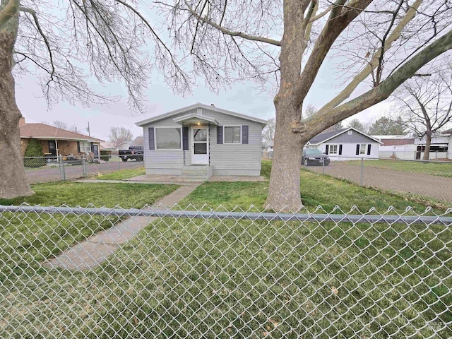 701 Union Ave, Filer, ID 83328 - bungalow featuring a front lawn, entry steps, and fence private yard