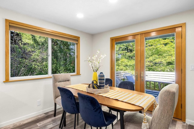 4130 S Ticonderoga Way, Boise, ID 83706 - dining area featuring baseboards, wood finished floors, and recessed lighting