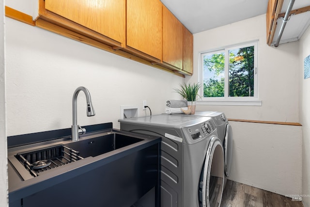 4130 S Ticonderoga Way, Boise, ID 83706 - laundry room featuring cabinet space, washer and dryer, and dark wood-style floors