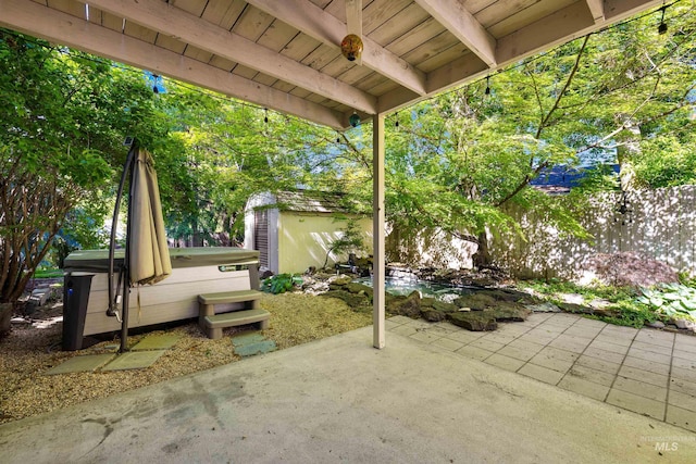 4130 S Ticonderoga Way, Boise, ID 83706 - fenced backyard featuring a patio area and a hot tub