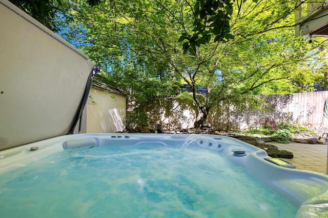 4130 S Ticonderoga Way, Boise, ID 83706 - view of swimming pool with a hot tub and a fenced backyard