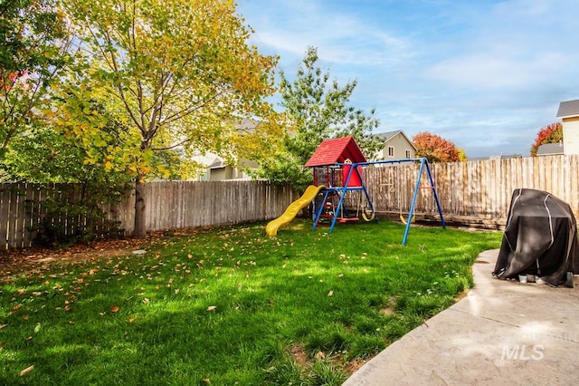 view of yard with a playground