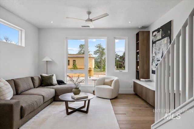 333 E Palapa Ln, Garden City, ID 83714 - living area with light wood-style flooring, a ceiling fan, and recessed lighting