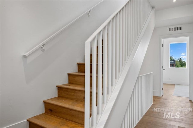 333 E Palapa Ln, Garden City, ID 83714 - staircase with wood finished floors