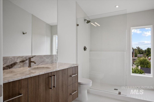 333 E Palapa Ln, Garden City, ID 83714 - bathroom featuring toilet, a walk in shower, and vanity