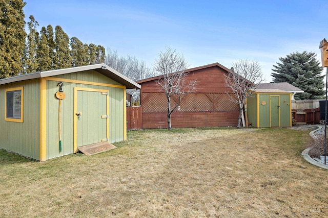 view of shed featuring a fenced backyard