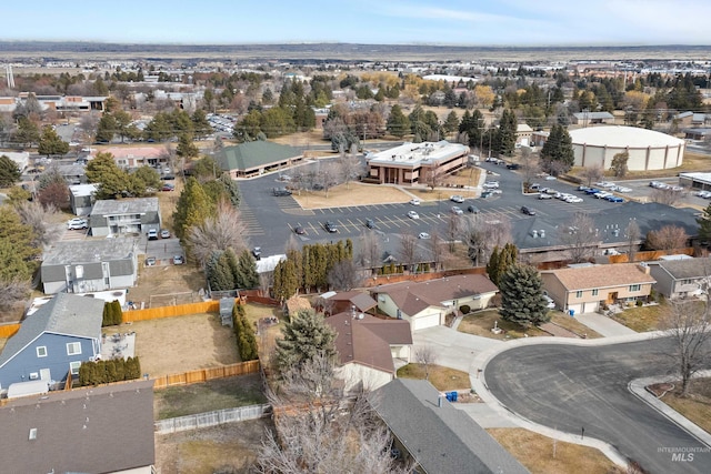 birds eye view of property with a residential view