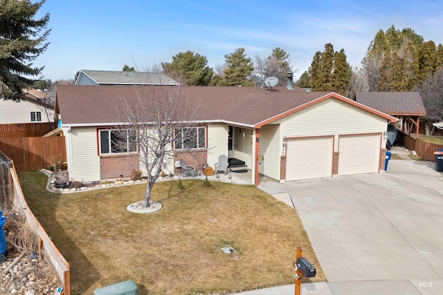 ranch-style house with concrete driveway, an attached garage, fence, a front lawn, and brick siding