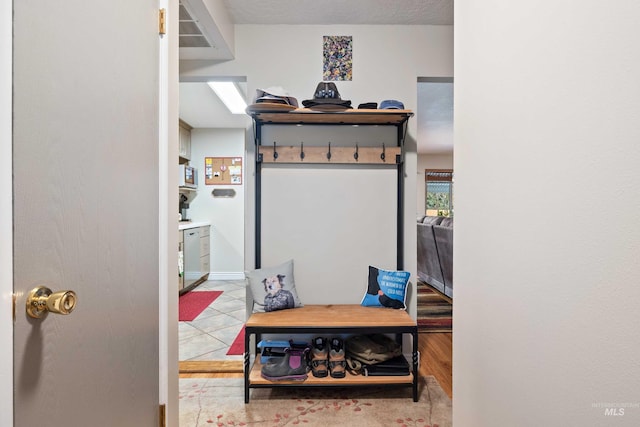 mudroom with tile patterned flooring