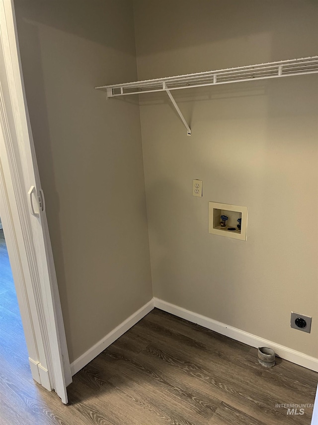 255 Elm, Vale, OR 97918 - clothes washing area with electric dryer hookup, wood finished floors, and baseboards