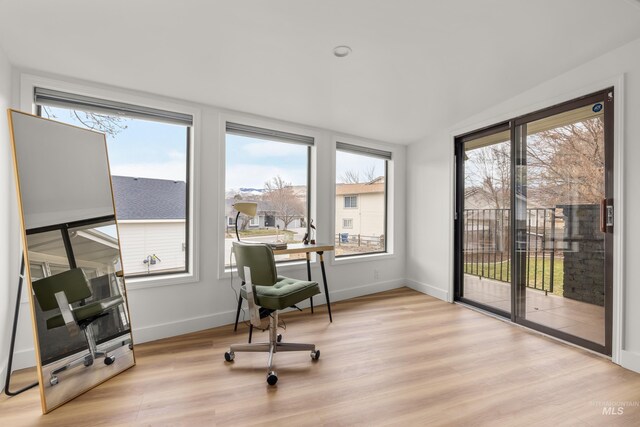 sunroom / solarium featuring a wealth of natural light