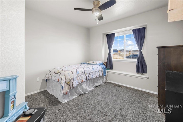 carpeted bedroom with ceiling fan