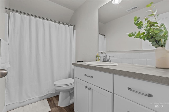 6413 E E Path, Nampa, ID 83687 - full bath featuring tasteful backsplash, vanity, wood finished floors, and toilet