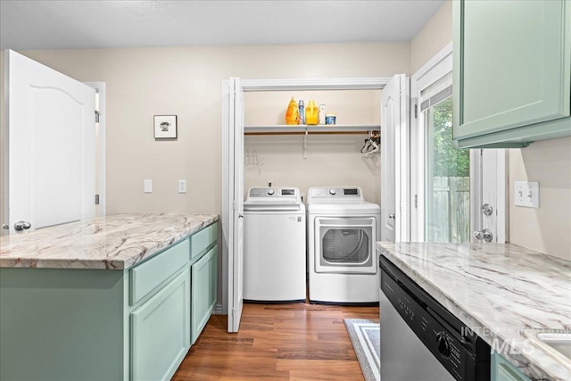 2972 N Saint James Pl, Boise, ID 83703 - laundry room with separate washer and dryer and wood finished floors
