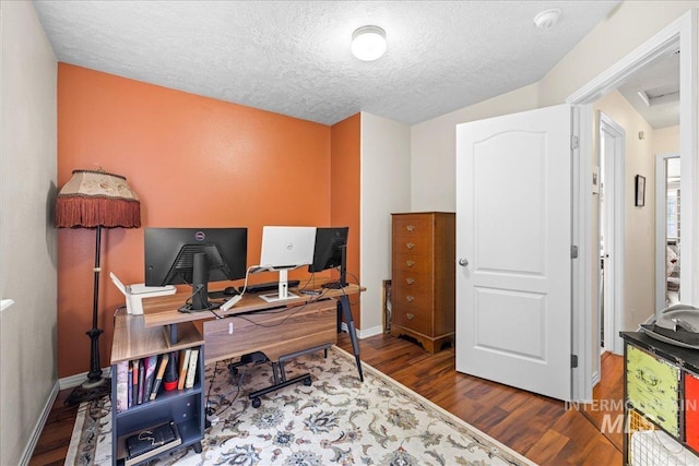 2972 N Saint James Pl, Boise, ID 83703 - office featuring dark wood finished floors and a textured ceiling