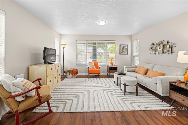 2972 N Saint James Pl, Boise, ID 83703 - living area featuring wood finished floors and a textured ceiling
