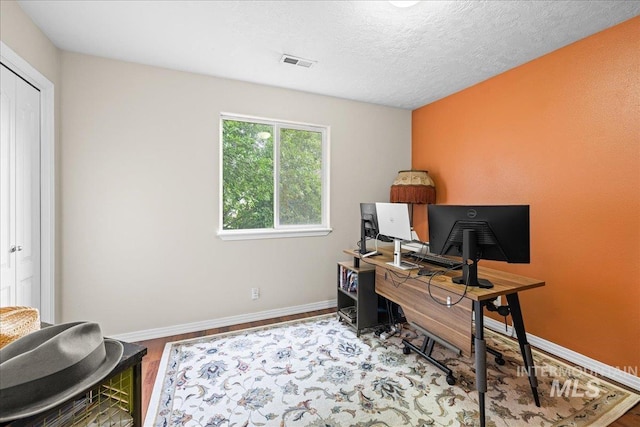 2972 N Saint James Pl, Boise, ID 83703 - home office with wood finished floors and baseboards