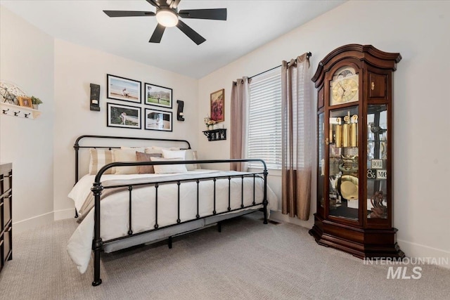 203 S Fusion Ave, Kuna, ID 83634 - bedroom with carpet flooring and baseboards