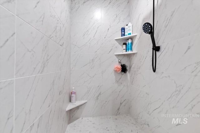 203 S Fusion Ave, Kuna, ID 83634 - bathroom with a tile shower
