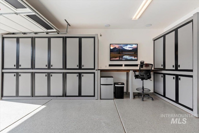 203 S Fusion Ave, Kuna, ID 83634 - garage featuring a desk