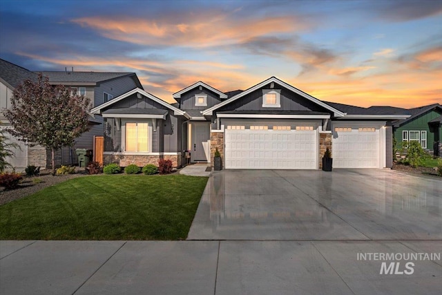 203 S Fusion Ave, Kuna, ID 83634 - craftsman-style home featuring stone siding, board and batten siding, an attached garage, and a front yard