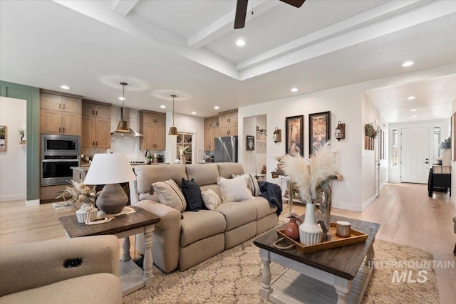 203 S Fusion Ave, Kuna, ID 83634 - living room featuring recessed lighting, light wood finished floors, baseboards, beam ceiling, and ceiling fan