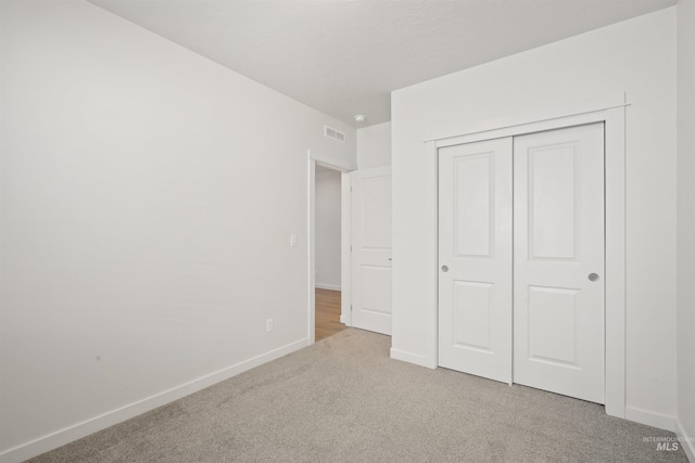 10663 W Catmint, Star, ID 83669 - unfurnished bedroom with carpet, baseboards, and a closet
