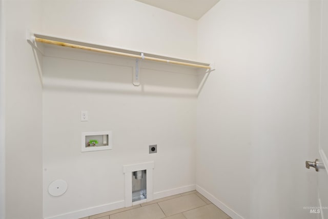 10663 W Catmint, Star, ID 83669 - laundry area with washer hookup, hookup for an electric dryer, light tile patterned floors, and baseboards