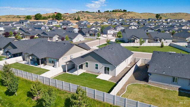 10663 W Catmint, Star, ID 83669 - aerial perspective of suburban area featuring a mountain backdrop