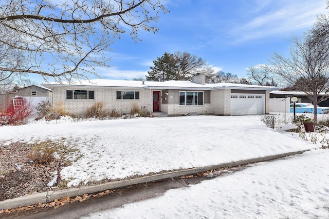 single story home with a garage