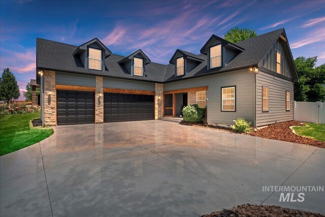 22798 Elsie St, Caldwell, ID 83607 - view of front of home featuring driveway, an attached garage, and roof with shingles