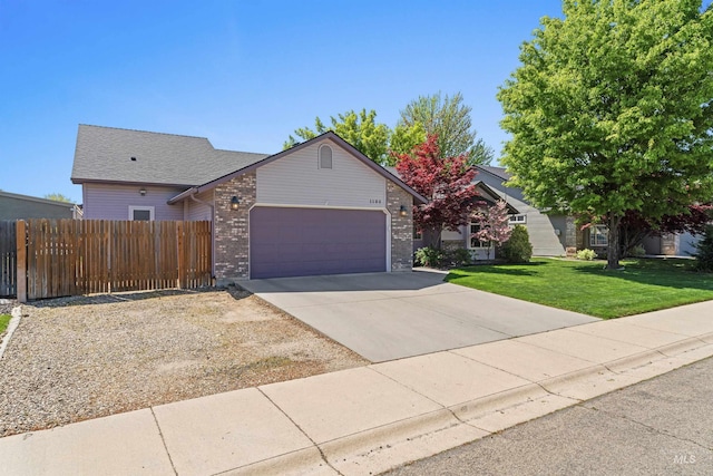 ranch-style home with a garage, concrete driveway, and brick siding