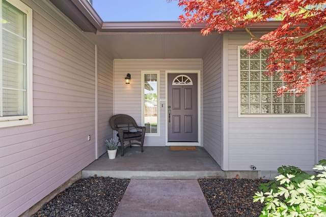 entrance to property with covered porch