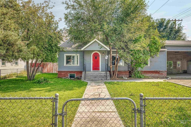 view of front of property featuring a front yard and a carport