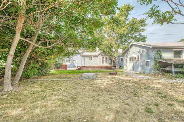 view of yard with a deck