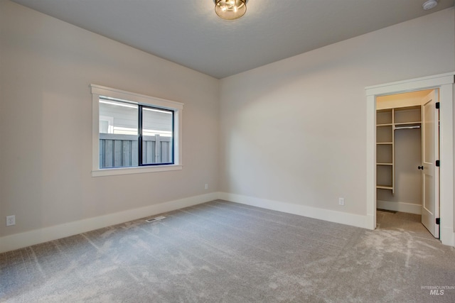 4219 W Thornapple Dr, Meridian, ID 83646 - unfurnished bedroom featuring carpet, a spacious closet, baseboards, and a closet