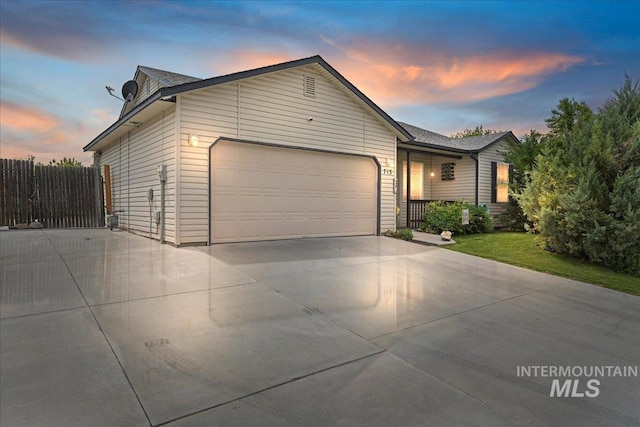 713 E Trail Creek Dr, Nampa, ID 83686 - ranch-style home featuring a garage and concrete driveway
