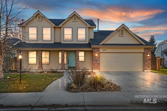 view of front of property with a garage