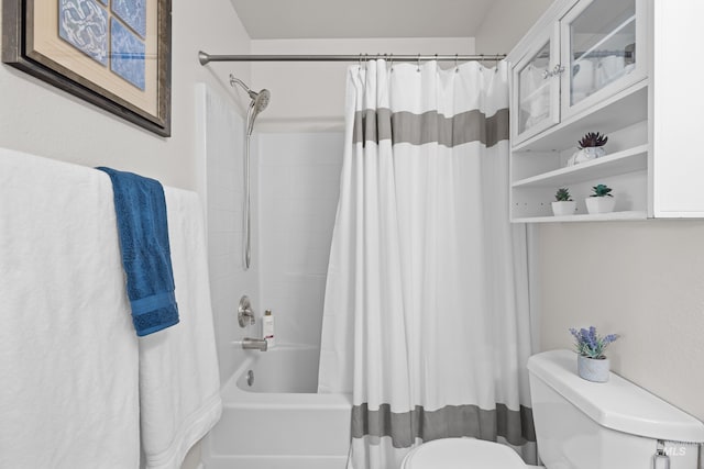 bathroom with toilet and shower / tub combo with curtain