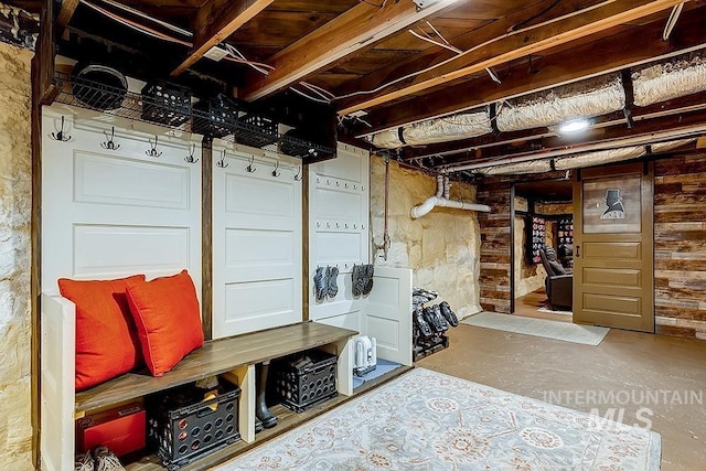 mudroom featuring concrete floors